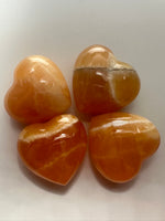 Load image into Gallery viewer, Orange Calcite polished hearts